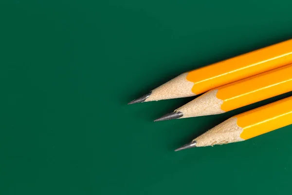 stock image clse up of Pencils on green background