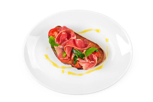 Cured ham, spanish appetizer on white background  
