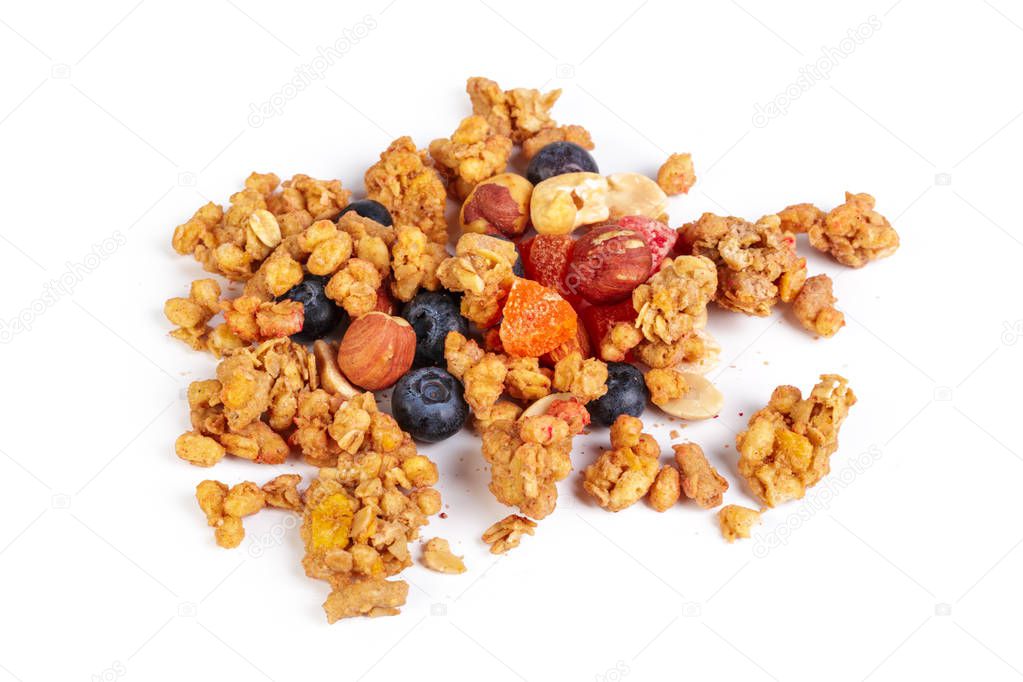 Granola with dried fruits isolated on white background 