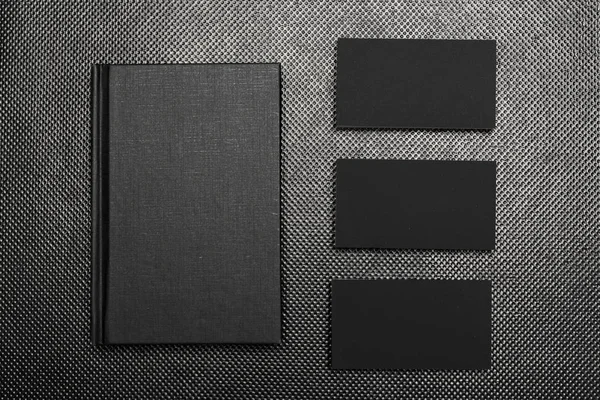 Black Paper Pieces Mock Black Background — Stock Photo, Image