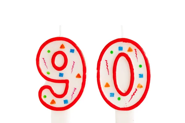 Colorful birthday candles isolated on white background