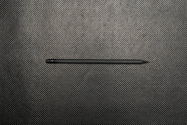 Schwarzer Bleistift Auf Schwarzem Hintergrund Von Oben — Stockfoto