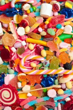 Farklı renkli meyve şekerleri arka planı kapat 