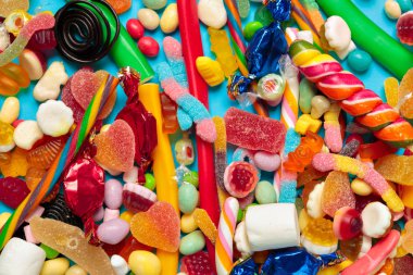 Farklı renkli meyve şekerleri arka planı kapat 