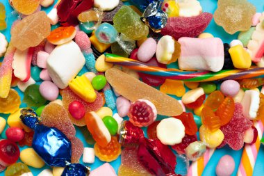 Farklı renkli meyve şekerleri arka planı kapat 