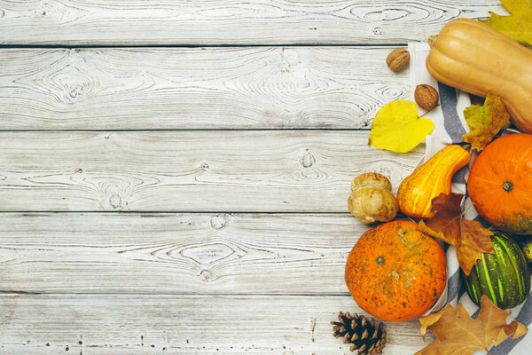 top view of Pumpkins on old rustic wooden table.