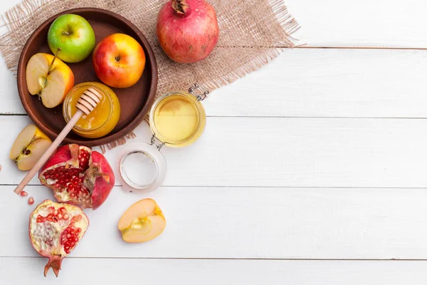 Apple and honey, traditional food of jewish New Year - Rosh Hashana.