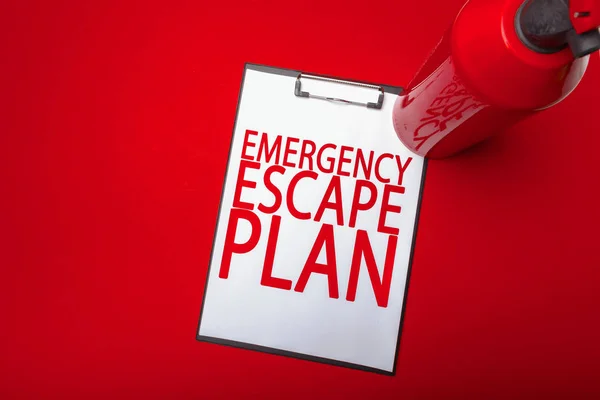 close-up of emergency evacuation plan, safety concept
