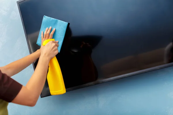 Housekeeper cleaning a hotel room