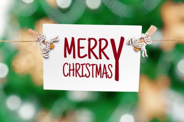 Neşeli Noel kartı bulanık bokeh arka plan üzerinde