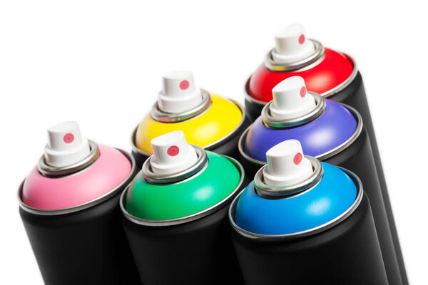 Spray paint cans isolated on white background