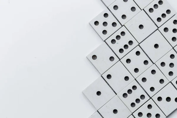 Closeup of domino game, risk concept