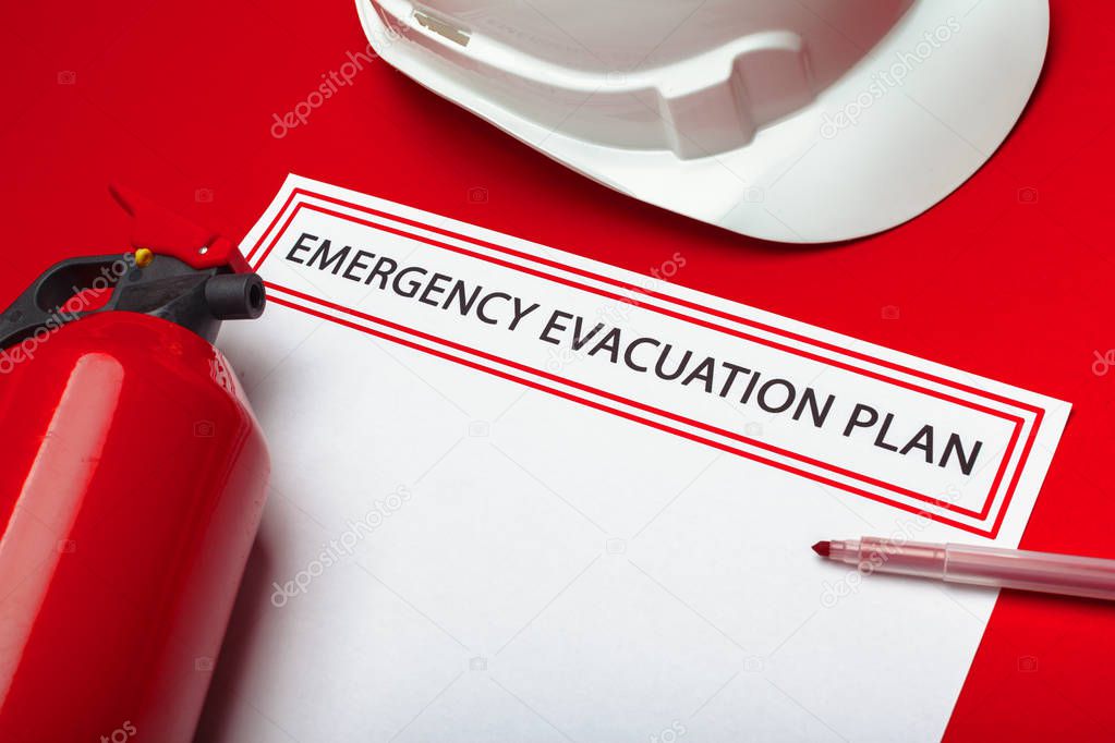 close-up of emergency evacuation plan, safety concept