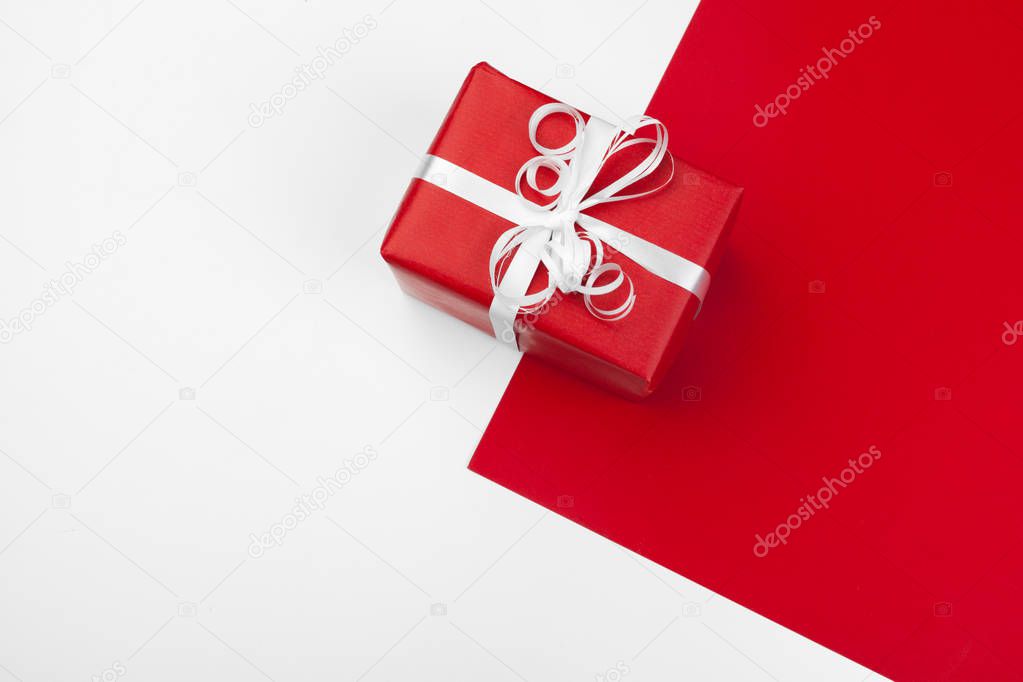 close up of gift box on color background