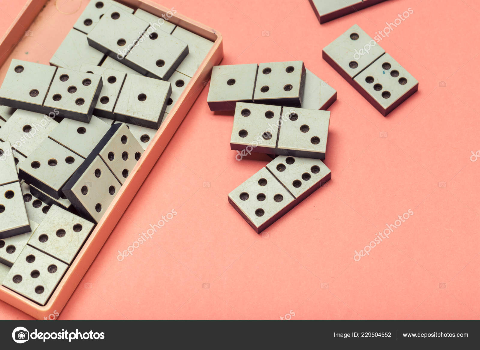 Closeup Domino Pieces Pink Background Game Stock Photo