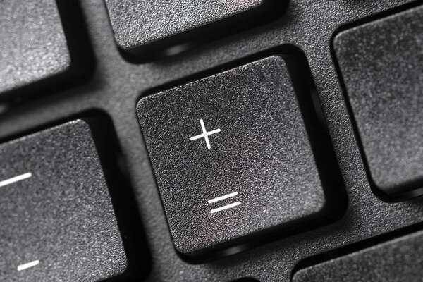 Black laptop keyboard close up