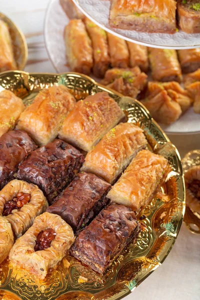 Traditional eastern arabic dessert Baklava with Turkish honey and walnuts, selective focus. Copy space