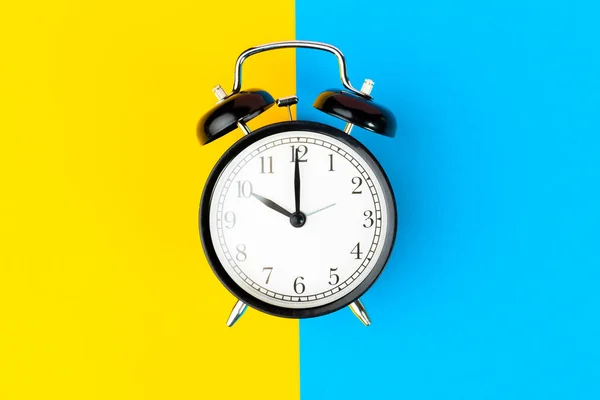 Black Alarm Clock Color Block Yellow Blue Background — Stock Photo, Image