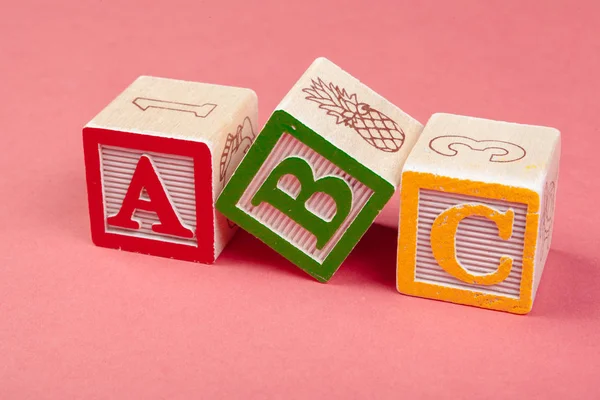 Alphabet blocks ABC close up, education concept