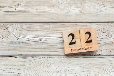 22 Aralık. Gün 22 Aralık ay, ahşap arka plan üzerinde takvim. Kış saati