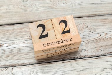 22 Aralık. Gün 22 Aralık ay, ahşap arka plan üzerinde takvim. Kış saati