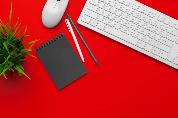 Styled stock photography red office desk table with stationery and office supplies