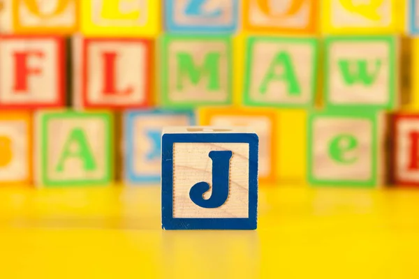 Photograph of colorful Wooden Block Letter J