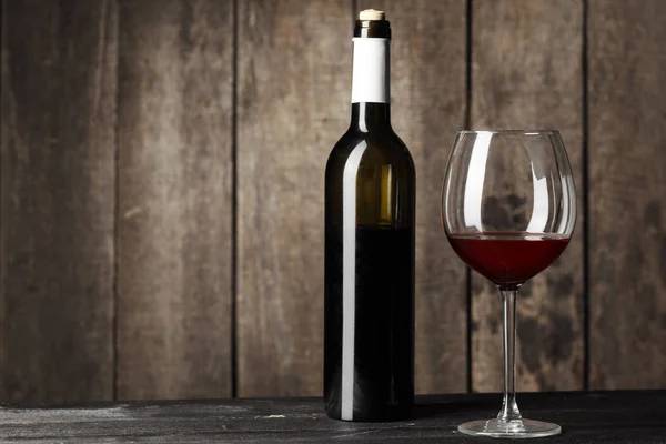 Glass Bottle Delicious Red Wine Table Wooden Background — Stock Photo, Image