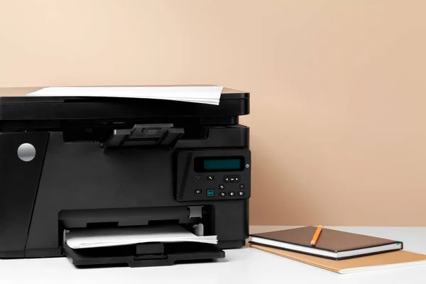 Printer, copier, scanner in office. Workplace.