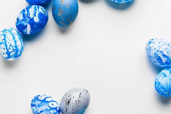 blue Easter eggs isolated on white.