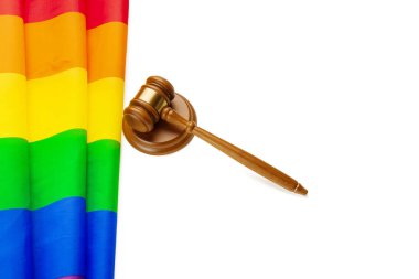 Wooden judge mallet and lgbt rainbow flag isolated. Law and lgbt clipart