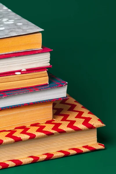 books isolated on green background