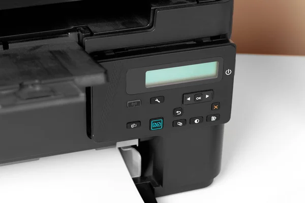 Close up of printer printing documents