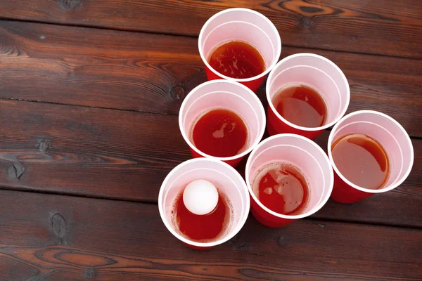 Cups for game Beer Pong on the table