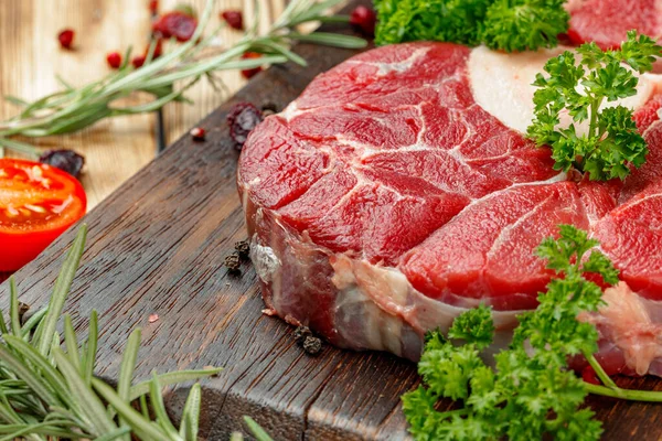 Raw meat slice for grill with seasoning Stock Photo