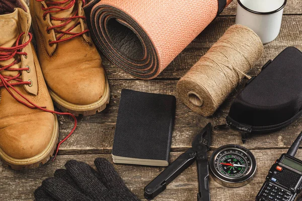 Equipment set for traveler including hiking boots and walki-talkie — Stock Photo, Image