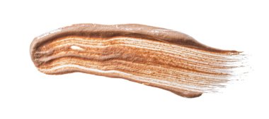 Bir krem temeli lekesi beyaza izole edilmiş.