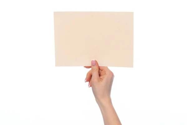 Craft paper card in female hand isolated on white — Stock Photo, Image