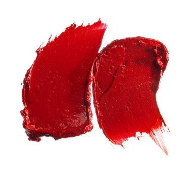 Beyaz arka planda ruj örneği. Kapat..