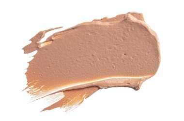 Bir krem temeli lekesi beyaza izole edilmiş.