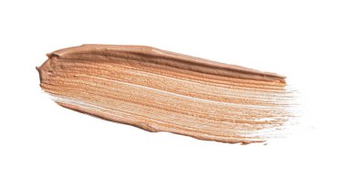 Krem bazlı lekeler beyaza izole edilmiş.