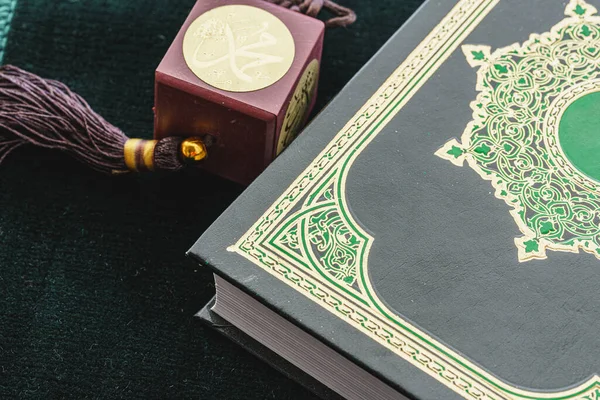 Oriental religious beads close up on a wooden table — Stock Photo, Image