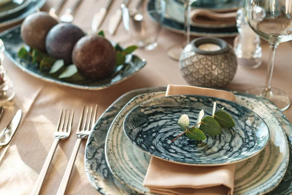 stock image Beautiful elegant table setting with green stylish dishware and silver cutlery