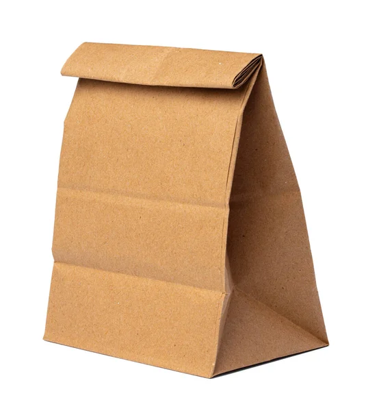 Řemeslný papír balíček pro potraviny na bílém pozadí — Stock fotografie