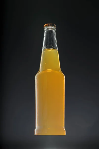 Beer bottle on dark background, copy space — Stock Photo, Image