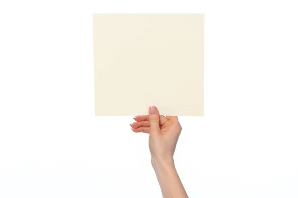Kobieca ręka pokazuje biały sztandar papieru izolowany na białym — Zdjęcie stockowe