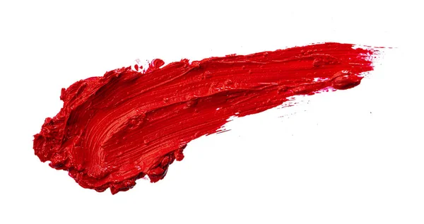 Échantillon de rouge à lèvres sur fond blanc. Gros plan. — Photo