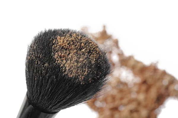 Crushed eyeshadows with brush isolated on white background. — Stock Photo, Image
