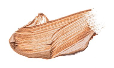 Krem bazlı lekeler beyaza izole edilmiş.