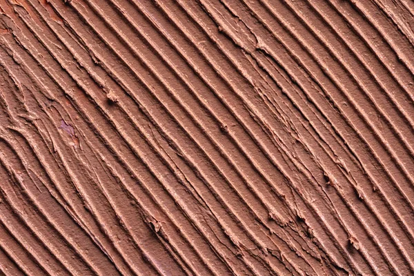 Texturerat utstryk av mörk hud foundation, bakgrund — Stockfoto